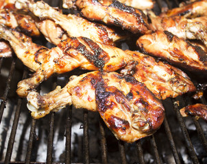 Grilled chicken Leg on the grill