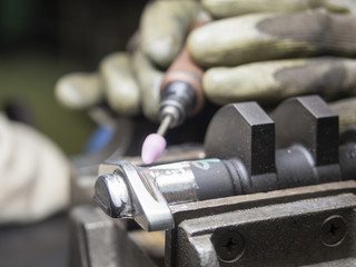 Naklejka premium operator finishing mold and die parts
