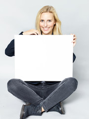 Woman with message board