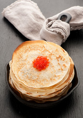 Pancakes with red caviar
