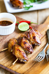 Grilled chicken wings with chili sauce