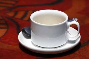 White cup and spoon