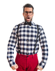 Posh boy shouting over white background