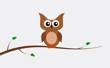 Fotobehang an owl on a branch © koft