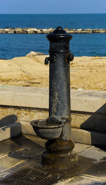 Characteristic old fountain of the promenade of Bari. Apulia