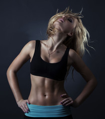 Fototapeta premium Sport blond woman with perfect abc and well trained body .