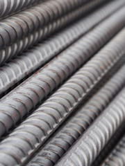 Steel rods or bars used to reinforce concrete