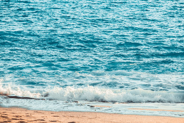 Fototapeta na wymiar Blue sea with waves