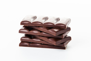 Chocolate bars stack isolated on white background.  Chocolate bl