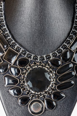 vintage fashion antique colorful jewelry necklace on black manne