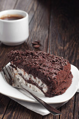 Chocolate cake in plate and coffee