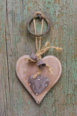 wooden carved heart at window