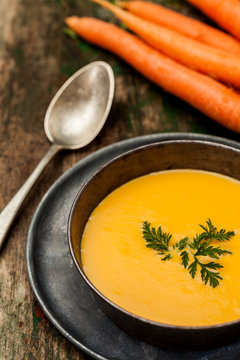 Carrot Cream over a Wood Background