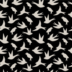 Seamless pattern made of swallow birds