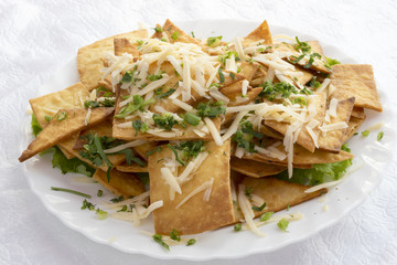 Homemade chips of thin cakes.