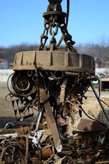 Electromagnetic pull scrap metal