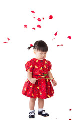 Obraz na płótnie Canvas Rain of flowers with little girl