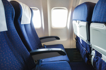 Naklejka premium fotele tekstylne w sekcji klasy ekonomicznej samolotu