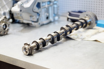 The image of a camshaft of car engine