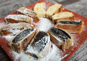 Homemade rool ith poppy seeds, walnut and cheese