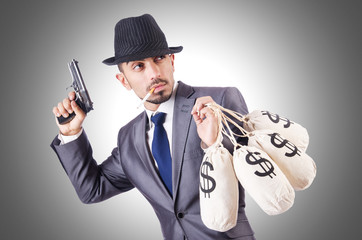 Businessman criminal with sacks of money