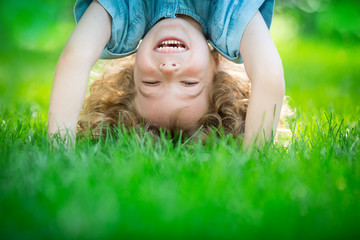 Child standing upside down