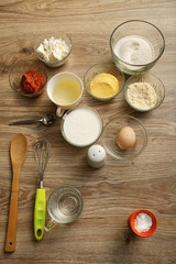 Fototapeta na wymiar Ingredients for salty muffins