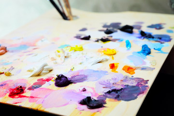 art paint palette with brushes and paints