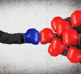 hands in red and blue gloves
