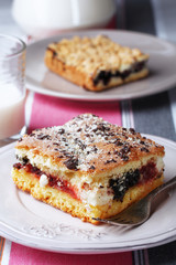 Homemade pies with jam and glass of milk