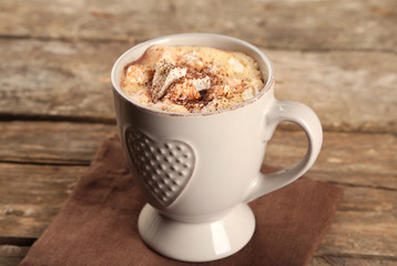 Cup of hot coffee with marshmallow