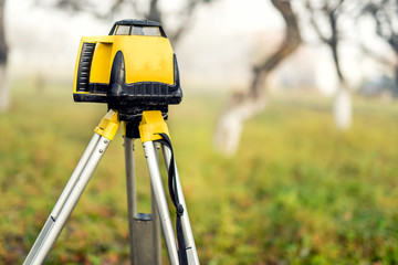 Surveying measuring equipment level theodolite on tripod