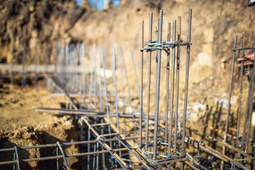 Reinforced steel bars on new construction foundation site