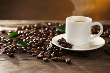 Cup of coffee on wooden table
