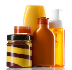 Group of cosmetic bottles isolated on white
