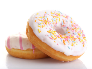 Delicious donuts with icing isolated on white