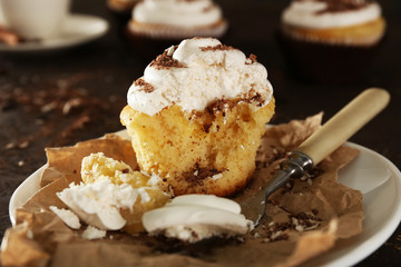 Delicious cupcakes on table close-up