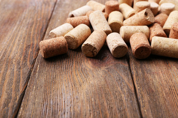 Wine corks on wooden background