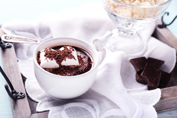 Hot chocolate with marshmallows in mug,