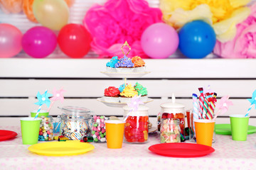 Prepared birthday table with sweets for children party
