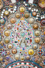 Colorful ceramic pattern decoration with pebbles on the wall