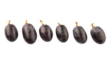 Black grapes over white background