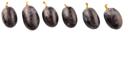 Black grapes over white background