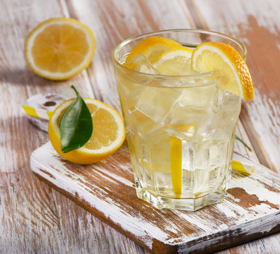 Glass of fresh water with  lemon.