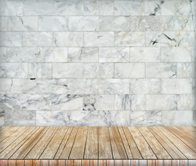 Backdrop marble brick wall and wood slabs in perspective.