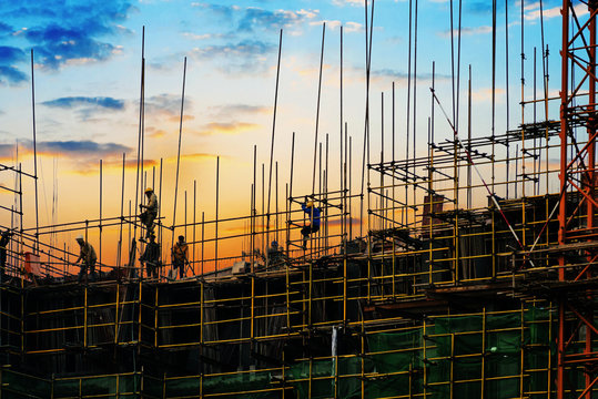 construction workers in the sunset