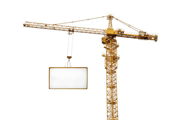 single yellow hoisting crane and advertisement hoardin