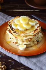 Sweet pancakes with honey and bananas