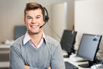 Customer Service Representative With Headset In Call Center