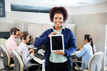 Customer Service Representative Displaying Tablet Computer